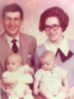Wendy Doyle as a baby with her twin brother Chad, father Wendell and mother Carol Davis on Mother's Day 1969.