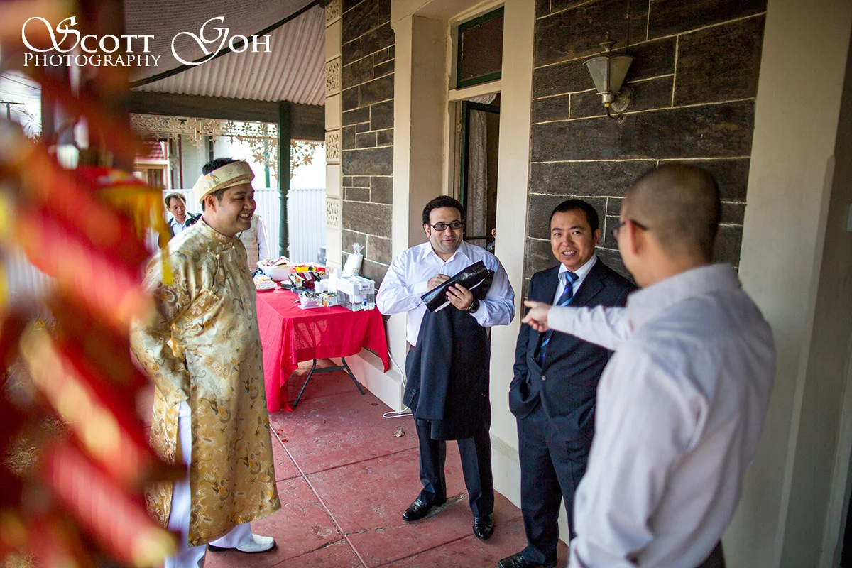groom chatting in wedding