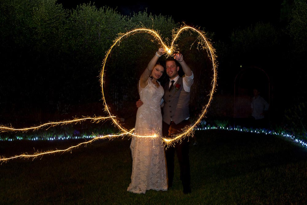 wedding couple night dark light trail photo