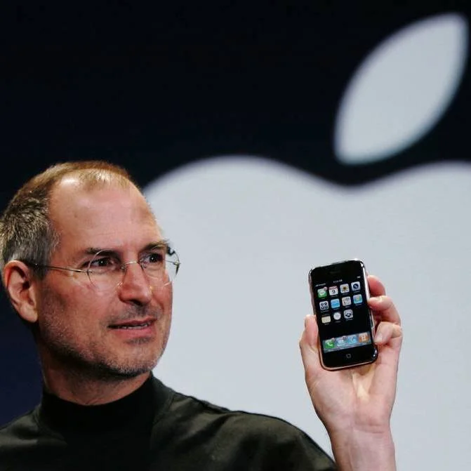 Jobs holding iPhone.jpeg