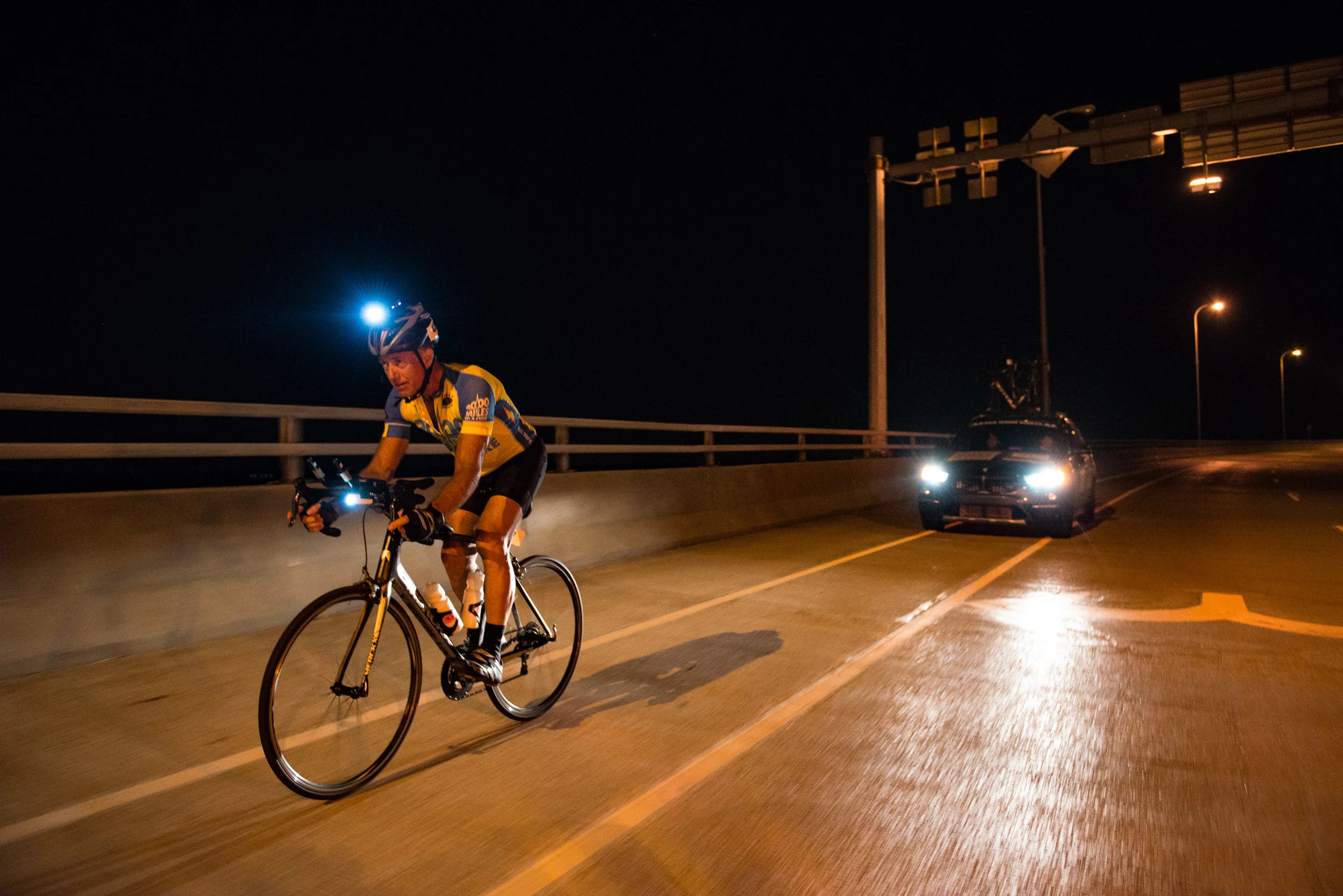 Marshall Reeves passes the Mississipi River bridge on the night of June 23rd, 2016, making the time cutoff. For many racers just getting to this point is a huge accomplishment because it represents completing two-thirds of the race.