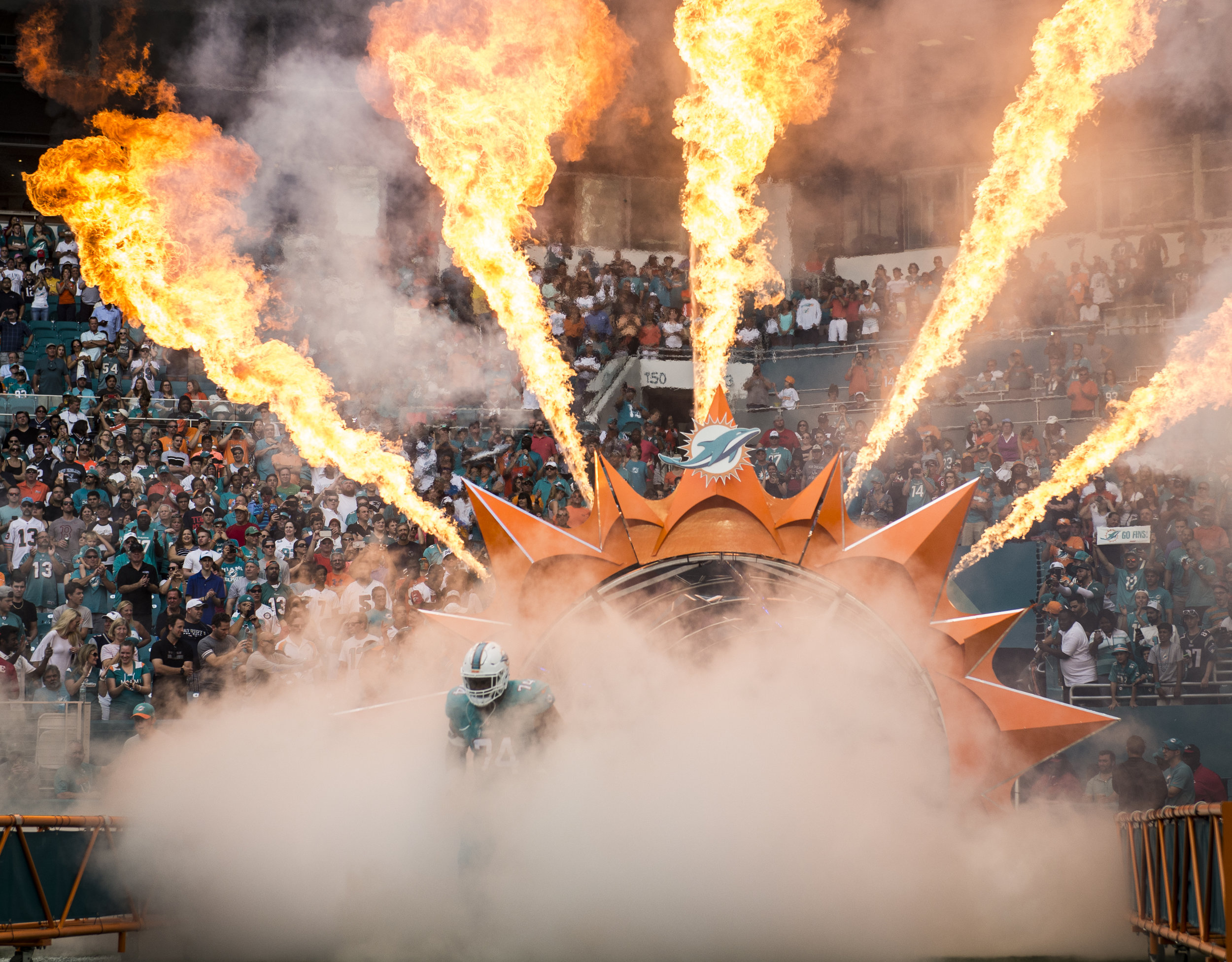  Miami Dolphins tackle Jermon Bushrod makes his entrance into the game versus the New England Patriots at Hard Rock Stadium in Miami Gardens, Florida, January 1, 2017. 