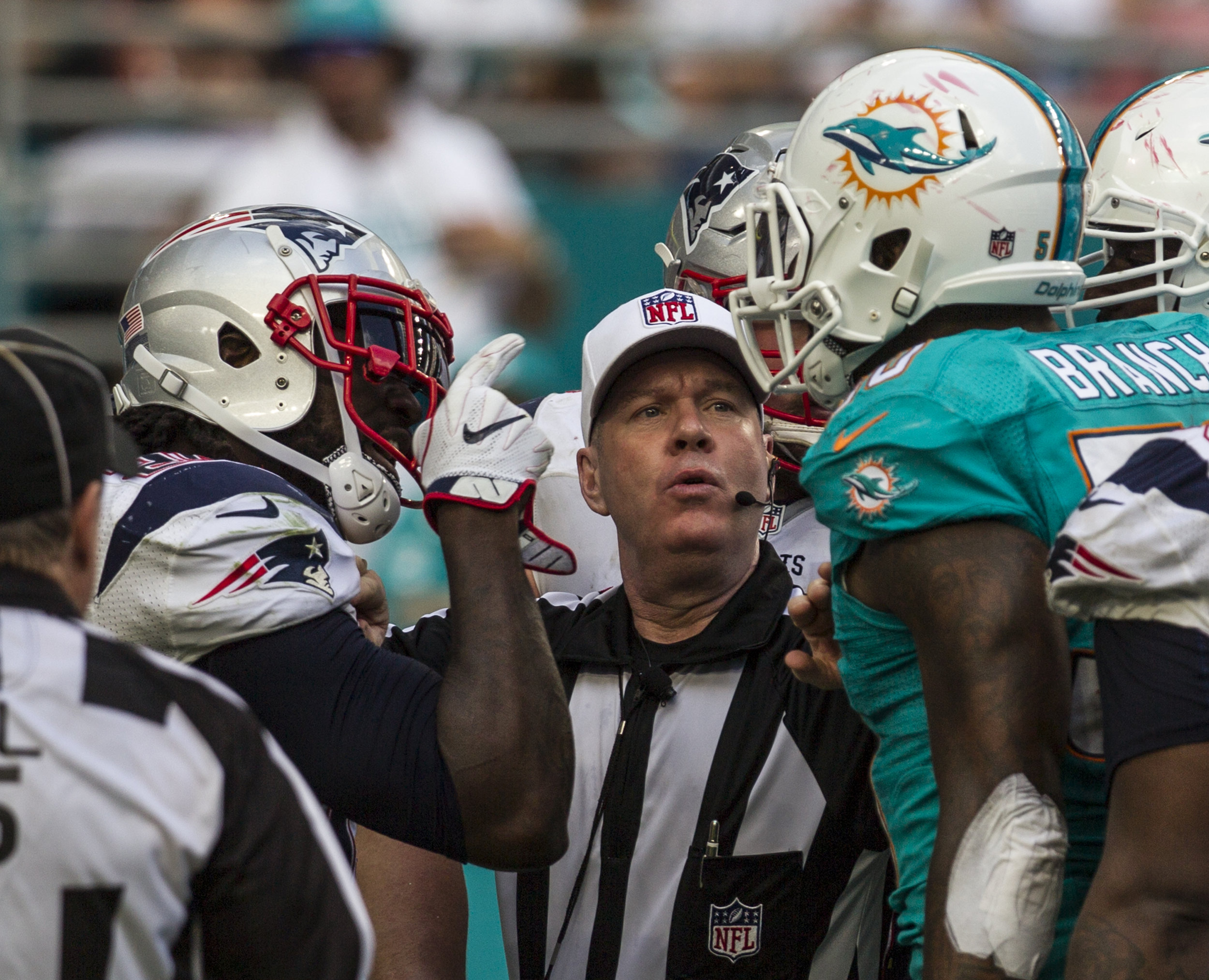  New England Patriots running back LeGarrette Blount argues with the Miami Dolphins defensive line after a play at Hard Rock Stadium in Miami Gardens, Florida, January 1, 2017. 
