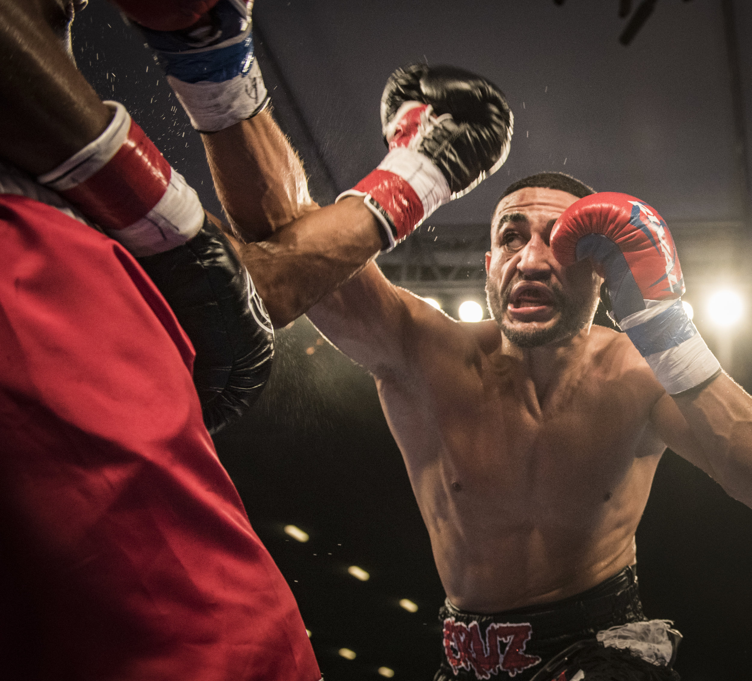  Robert Daniels Jr. is hit by an uppercut as he attempts to throw a punch in his fight versus Alex Martin at Hialeah Casino park. 