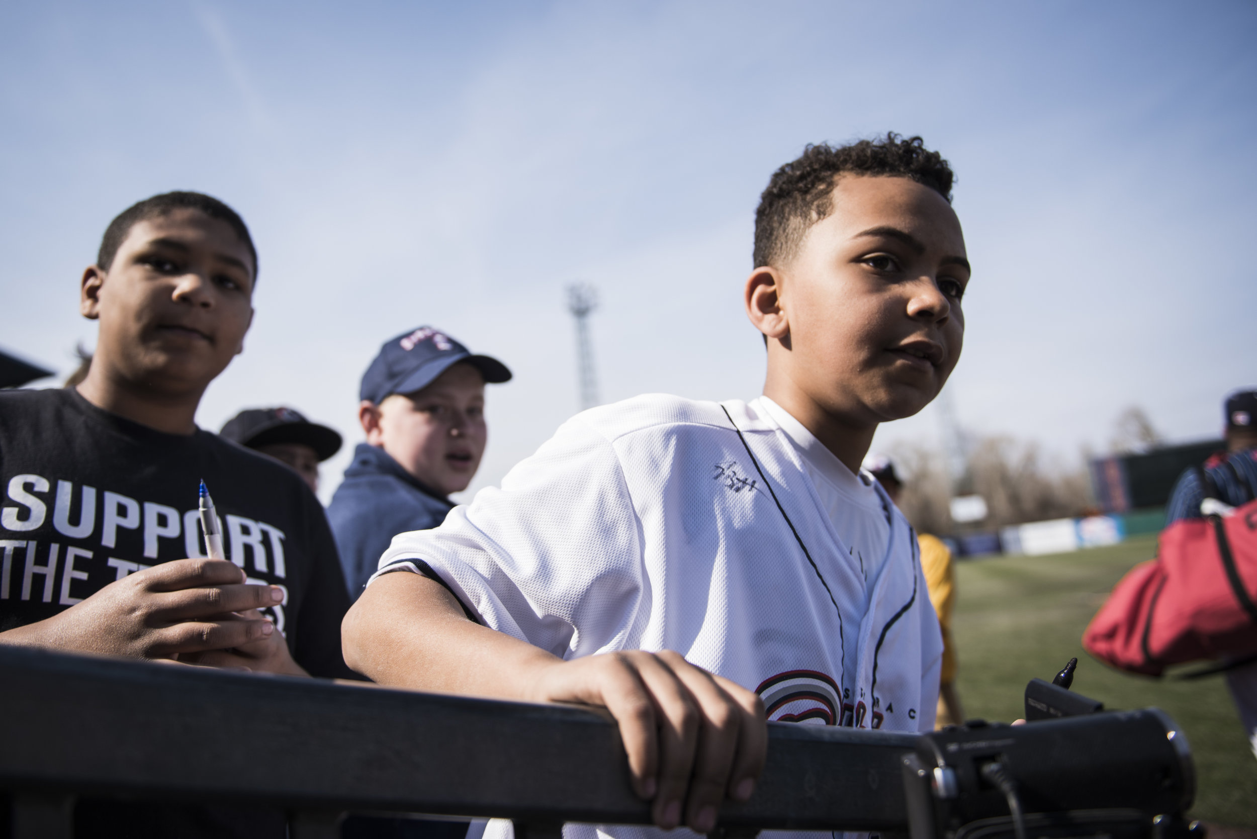  Young fans wait for Syracuse Chiefs players to come sign memorabilia ranging from old jerseys to baseball cards, before the Chiefs game against the Rochester Red Wings on April 9th, 2017. 