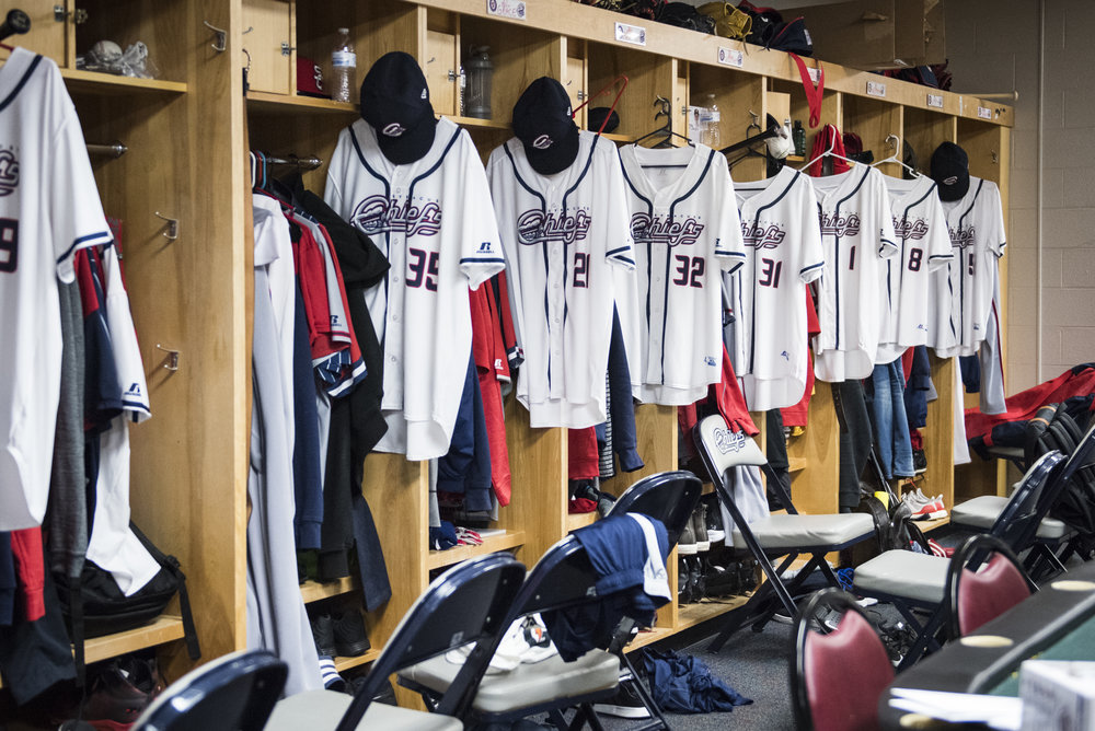  The Syracuse Chiefs locker room before a game against the Norfolk Tides on April 23rd, 2017. Rafael Bautista's number 8 jersey hangs in front of his locker. 