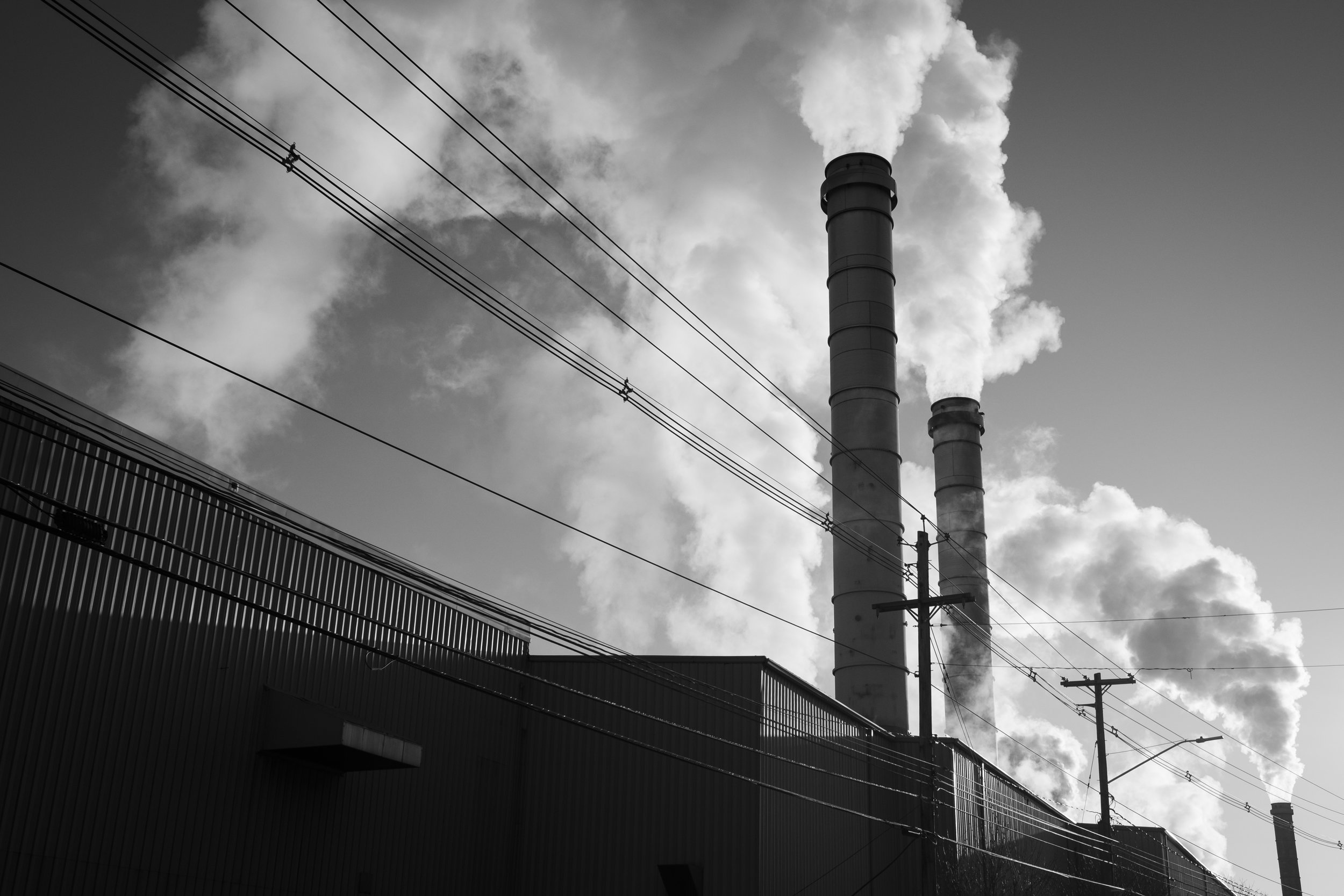  As I was driving into Syracuse I saw this chain of factories being lit by the morning sun and had to stop to make this frame. 