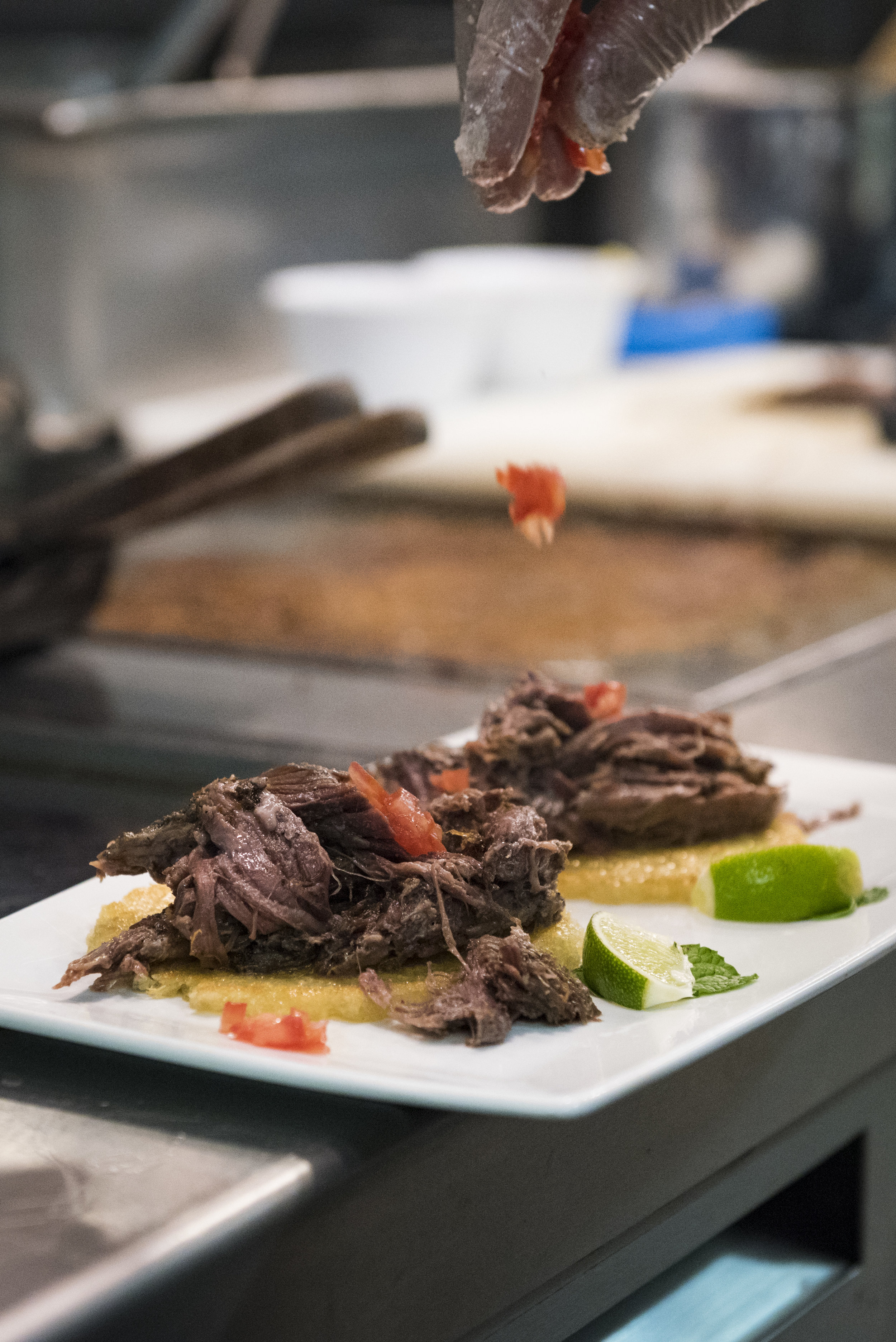  Roberto Copa Matos puts the finishing touches on one of his most famous dishes, 'Copa Vieja a la Americana.' He describes the dish as a "long-forgotten version of Cuba's signature dish, ropa vieja: NC grass-fed beef, slow-cooked with wine, mint, and