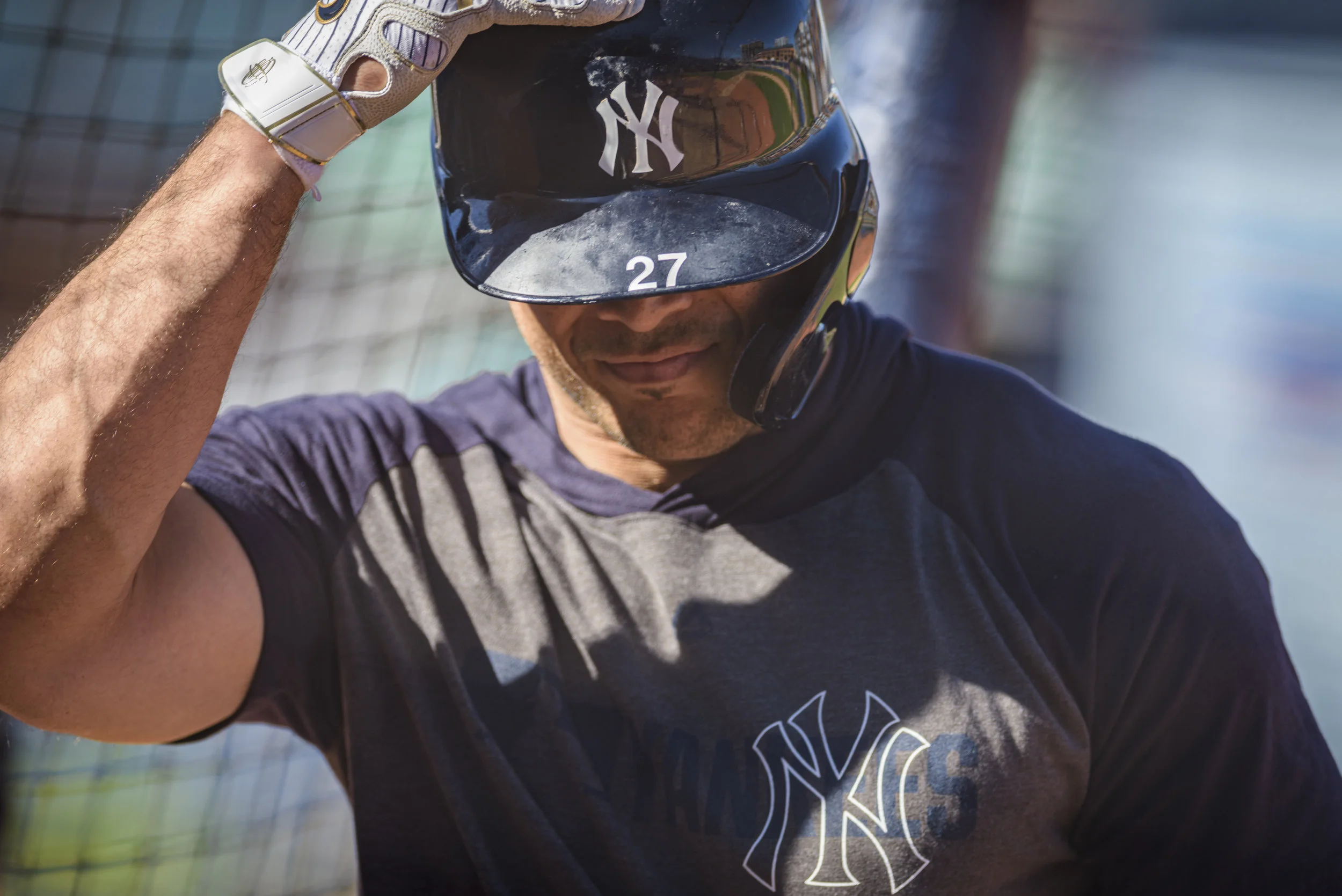 New York Yankees outfielder Giancarlo Stanton walks out of the batter's box after completing batting practice with the Wilkes-Barre RailRiders, the Yankees' Triple-A affiliate, on June 14, 2019 at Durham Bulls Athletic Park in Durham, NC.