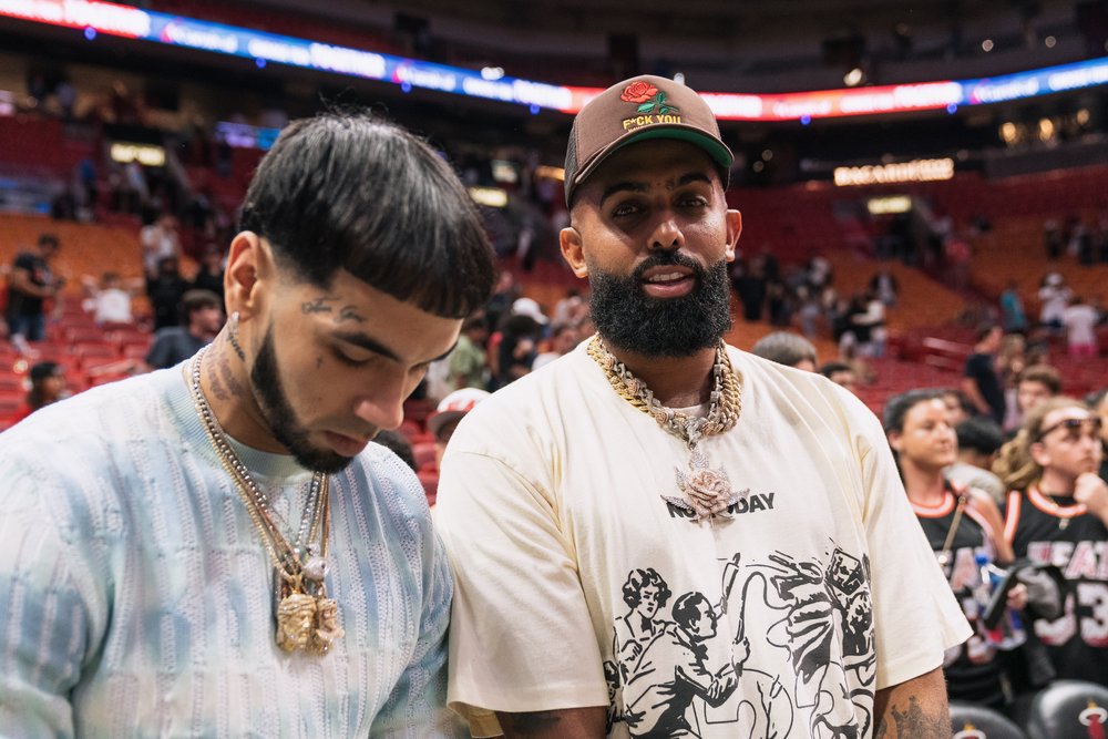  MIAMI, FL - APRIL 11: Reggaeton and Latin Trap artists Anuel AA (L) and Eladio Carrion (R) after the Miami Heat game against the Atlanta Hawks at Kaseya Center on April 11, 2023 in Miami, Florida. 