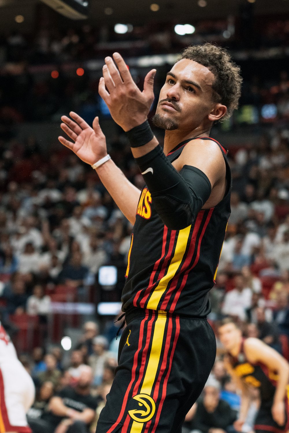  MIAMI, FL - APRIL 11: Trae Young #11 of the Atlanta Hawks reacts after not receiving a foul call during a game against the Miami Heat at Kaseya Center on April 11, 2023 in Miami, Florida. 