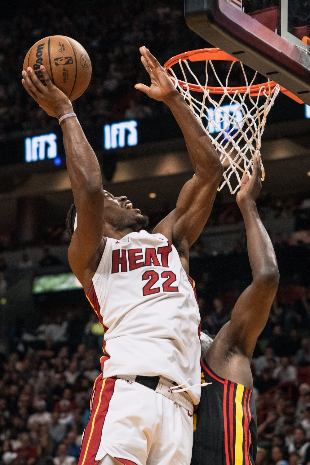  MIAMI, FL - APRIL 11: Jimmy Butler #22 of the Miami Heat scores a layup during the game against the Atlanta Hawks at Kaseya Center on April 11, 2023 in Miami, Florida. 