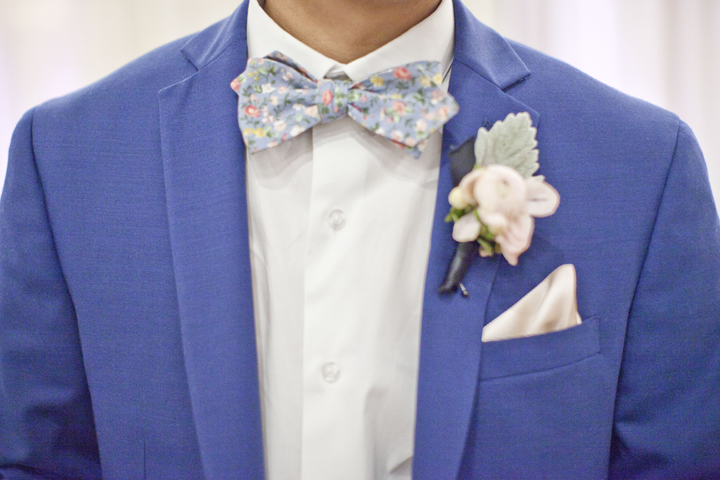 Our dapper groom with the best suit and bow tie...like ever.