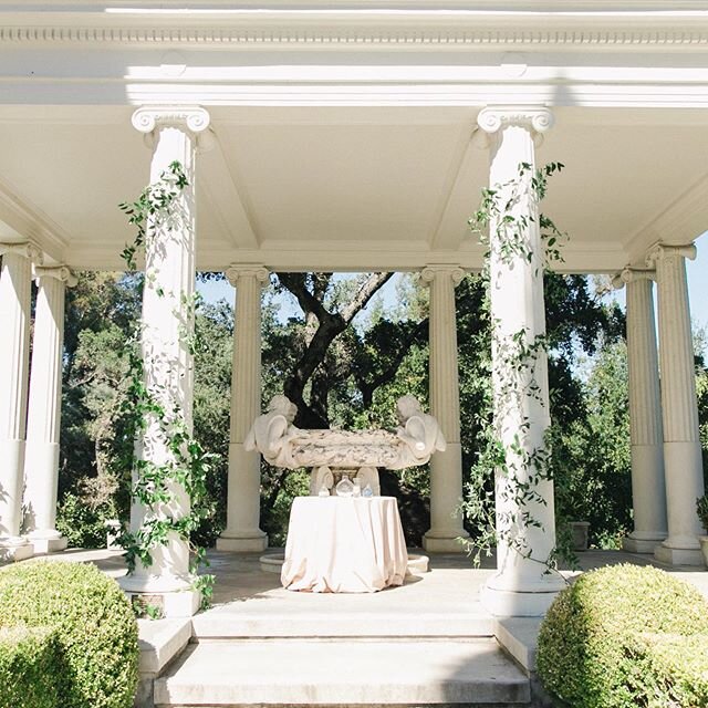 One of our favorite places for our couples to say I do at because it is reminiscent of so many classically romantic, beautiful places in Europe.  I love the way that this ceremony space was designed with foliage running up the columns, because when y