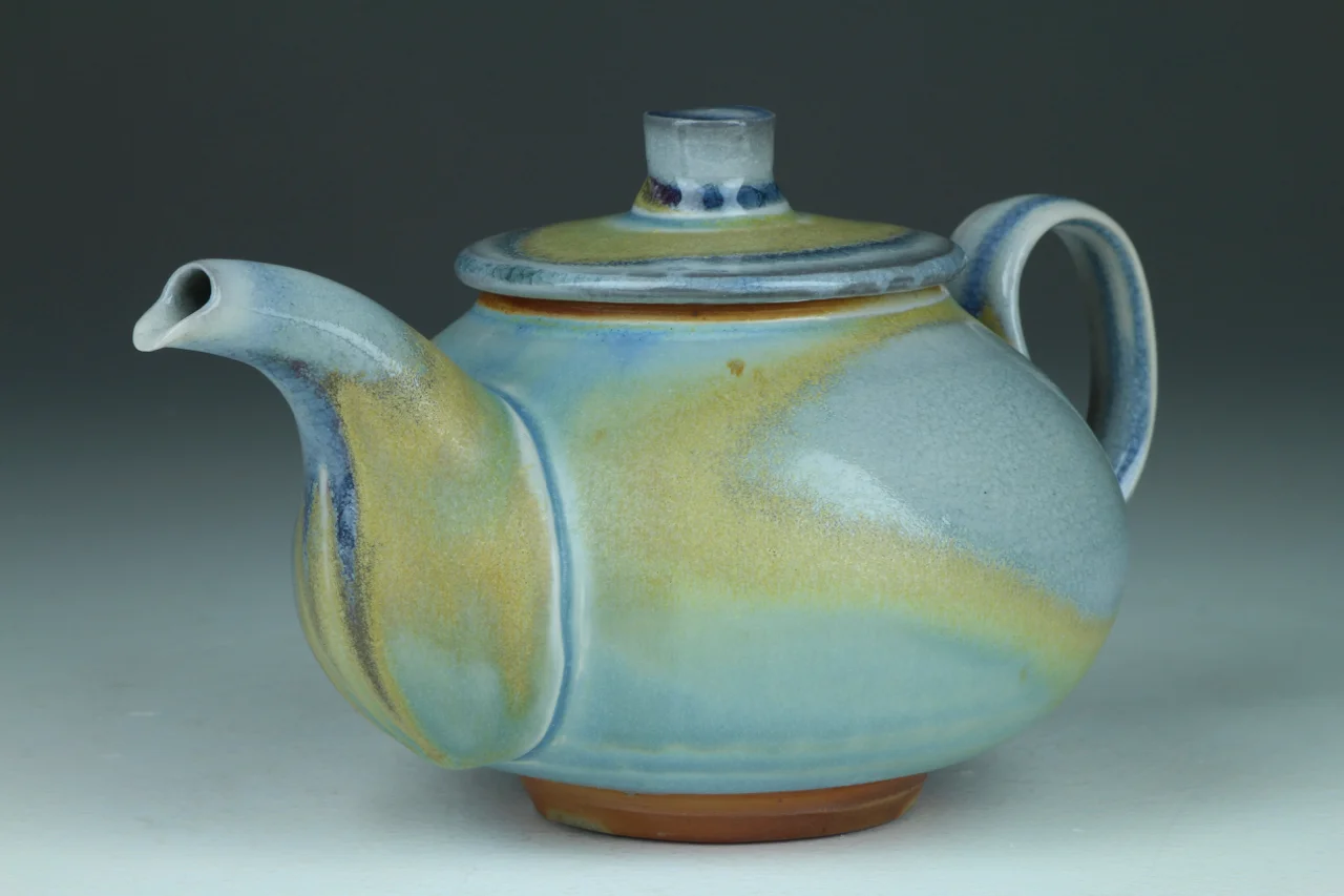 Teapot, 6" high, Glazed porcelain, soda chamber.