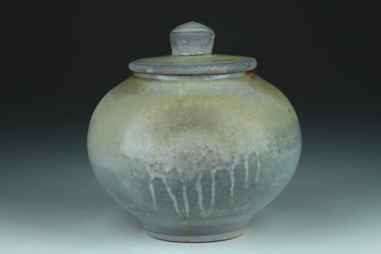 Covered Jar, 8" high, porcelain.