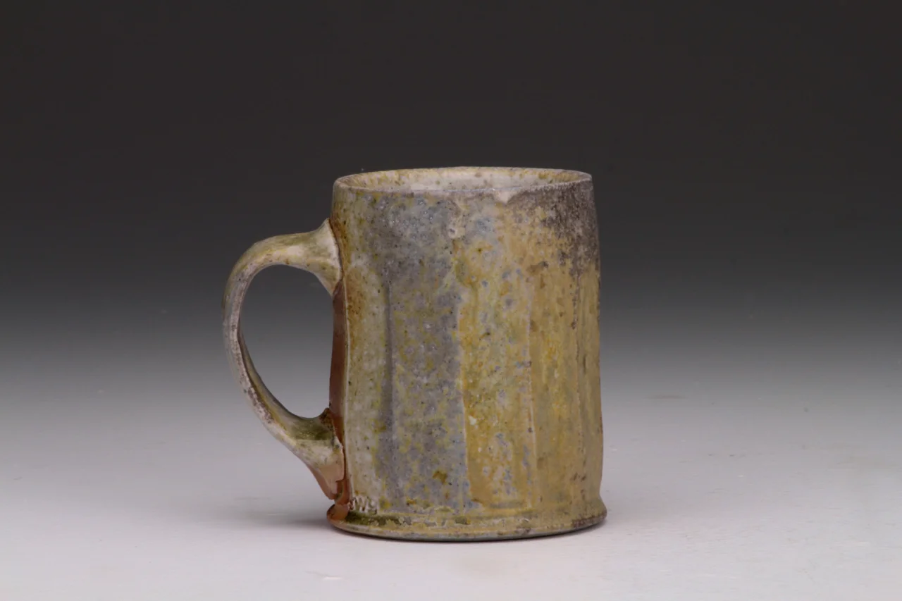 Coffee cup, 4.5" high, stoneware with local clay slip.