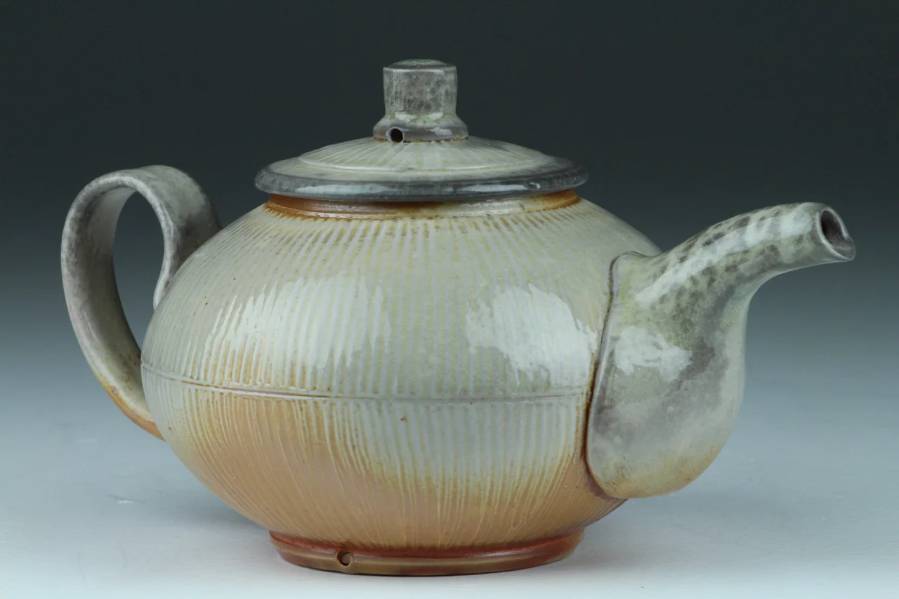 Teapot, 6" high, porcelain, soda chamber.