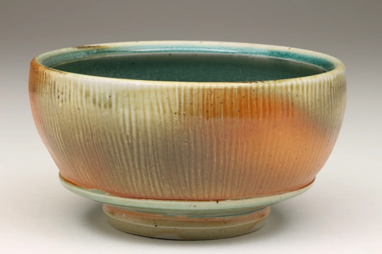 Medium bowl, 6" diameter, glazed porcelain with flashing slip, soda chamber.