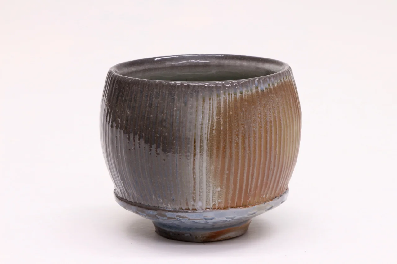Yunomi, 4" high, glazed porcelain with flashing slip, soda chamber.