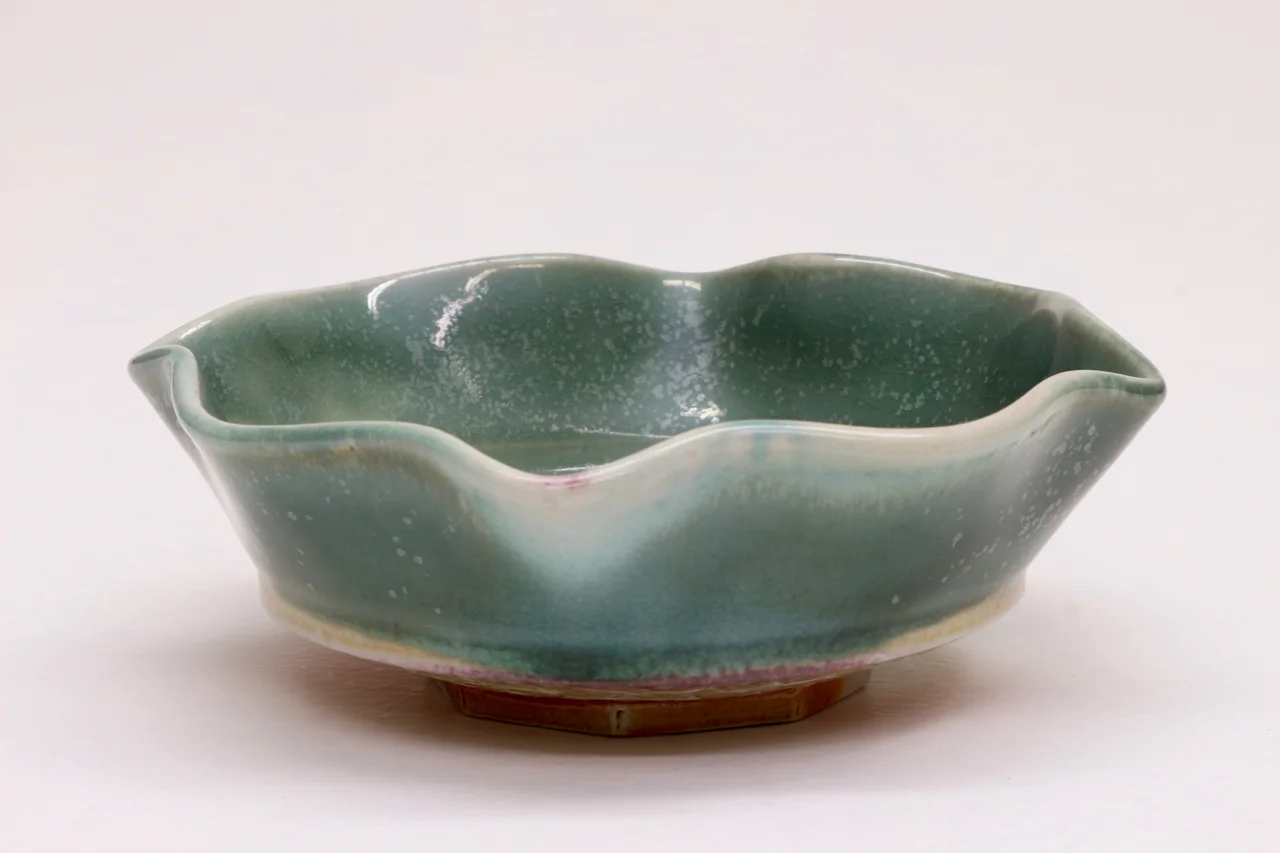 Small bowl, 5" diameter, glazed porcelain with flashing slip, soda chamber.