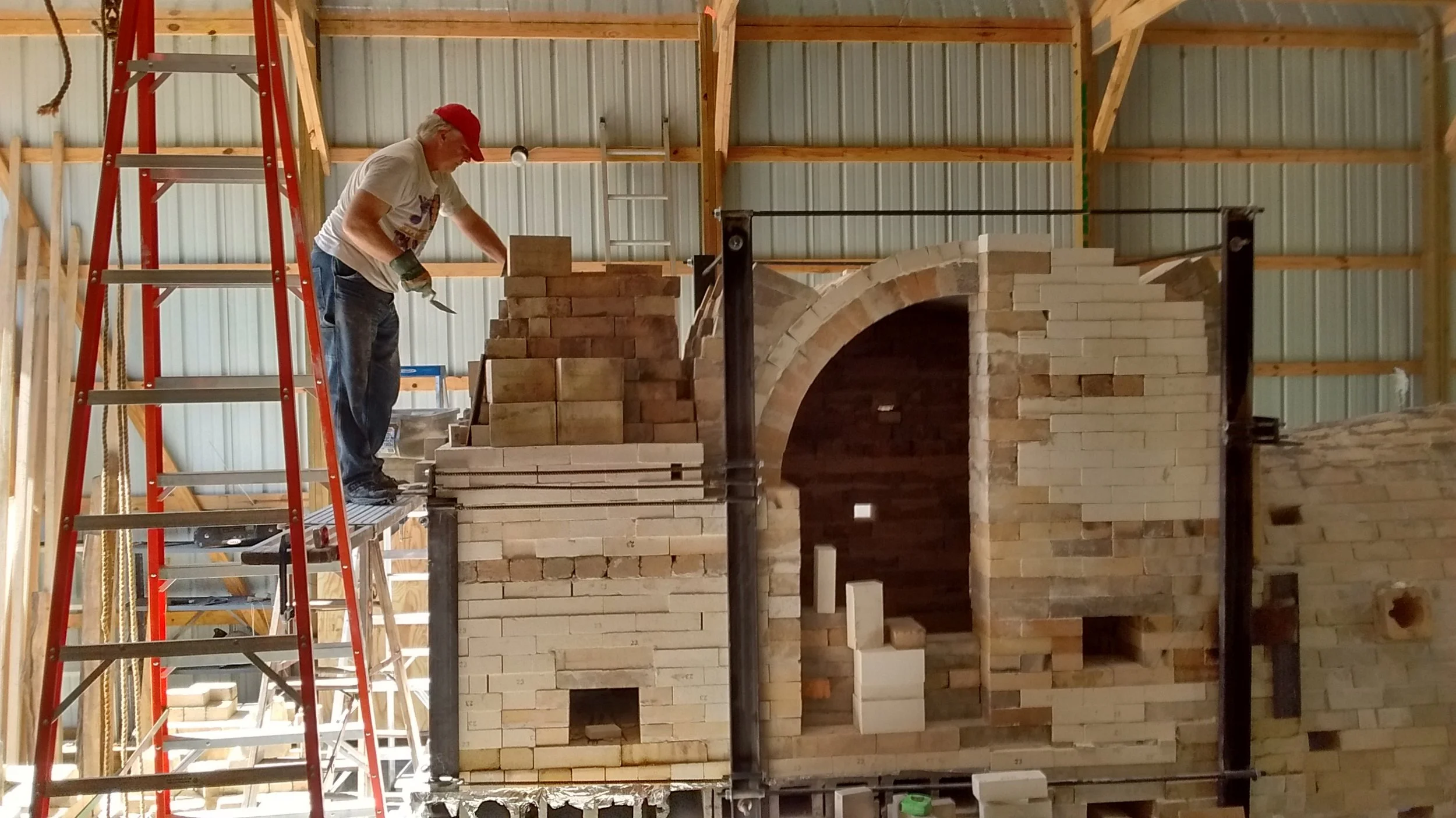 Dan figuring out the corbel of the chimney taper.