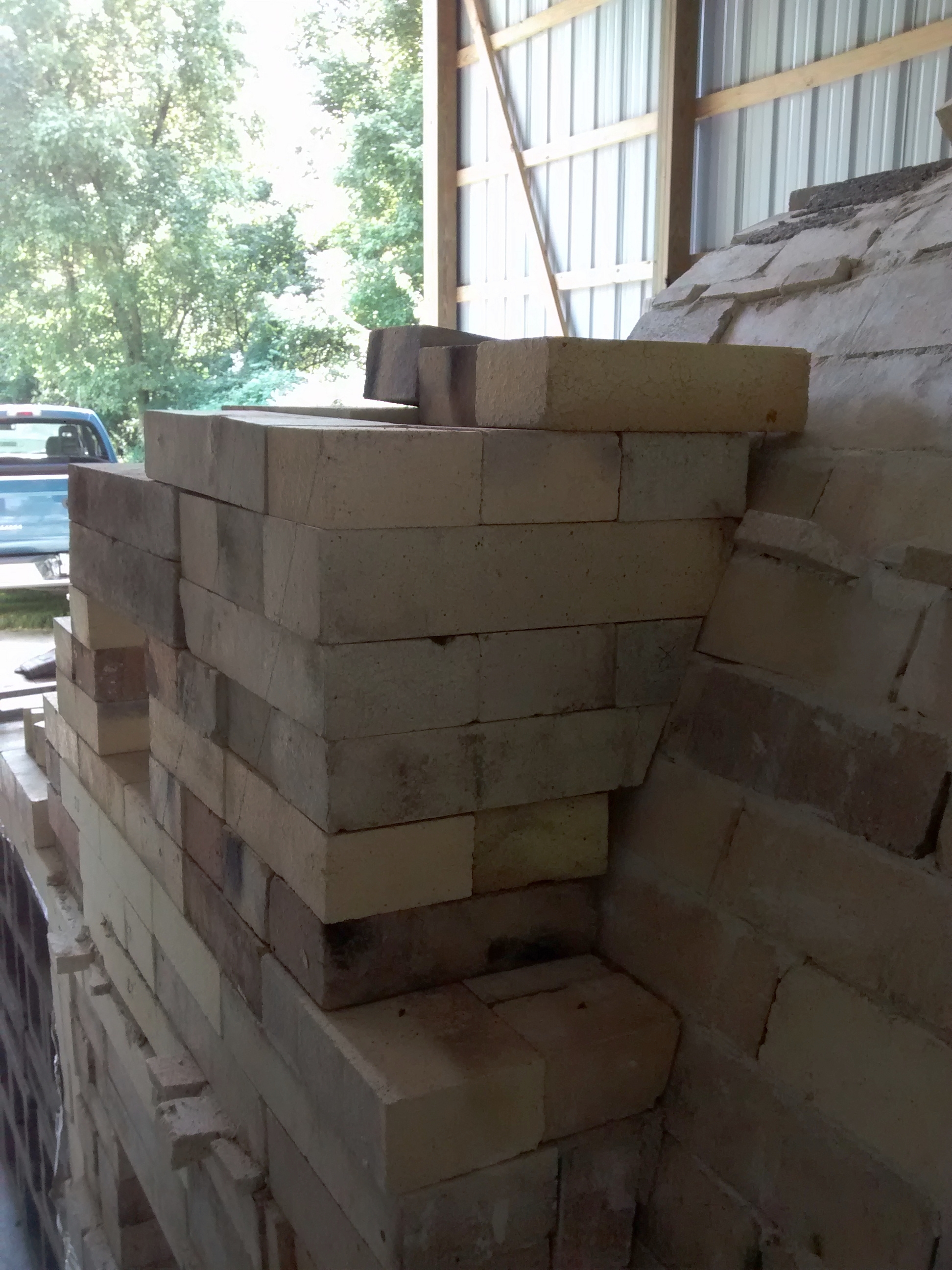 The second chamber overlaps the first by 13.5 inches. It's a puzzle to get square bricks to match a curved arch.