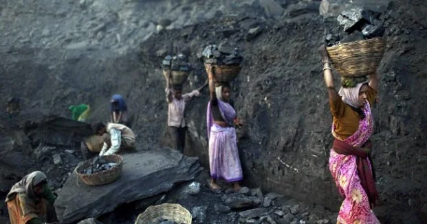 Workers in an Indian Coal Mine. Image via greatindaba.com