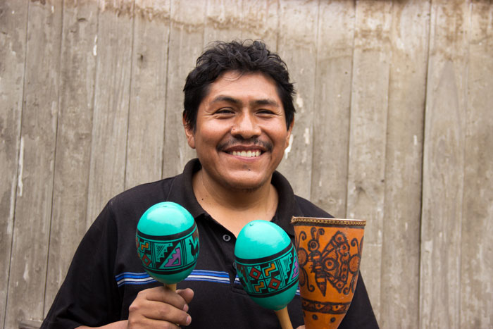 Rufino with his handcrafted instruments. Photo courtesy of Intercrafts Peru