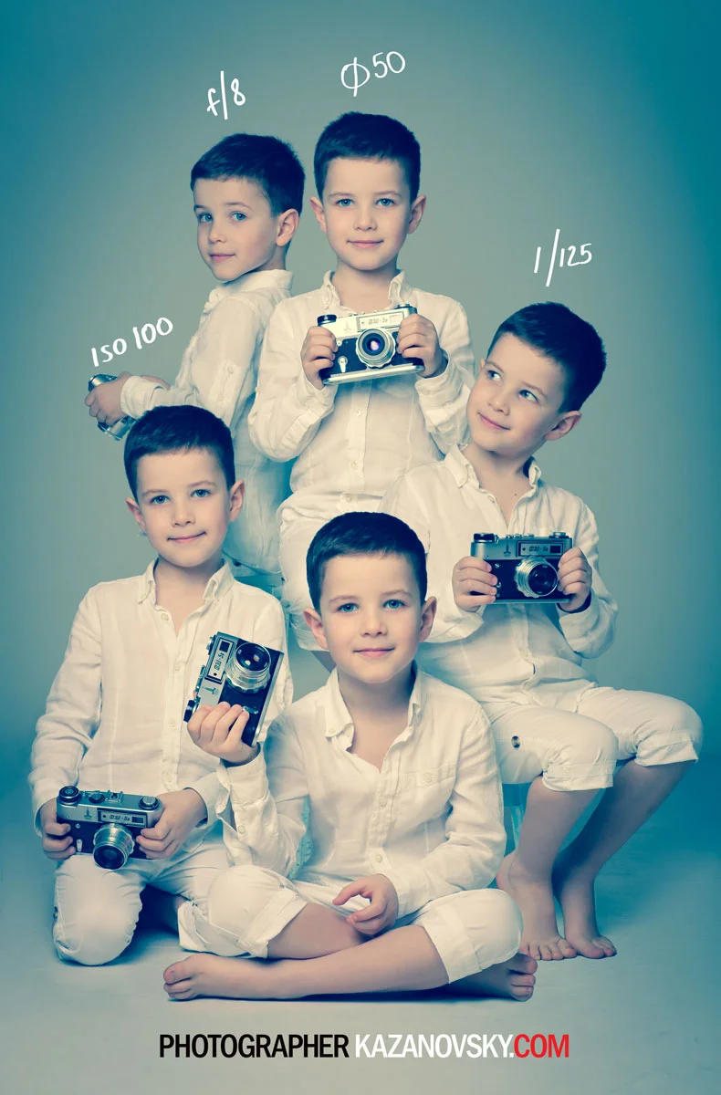 Group of five young boys dressed in white clothing, holding vintage cameras, with camera settings written above their heads including f/8,  50, 150/100, and 1/125, posing against a plain background. The text "Photographer Kazanovsky.com" is at the b
