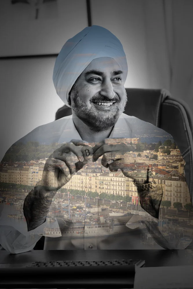 Black and white photo of a man wearing a turban and smiling, holding a Bitcoin coin. A colorful cityscape with ships on a river is overlaid on the image, creating a double exposure effect.