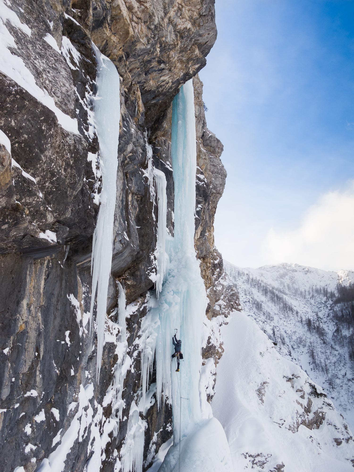 Climber on the infamous Lambada ice fall, Julian Alps, Slovenia
