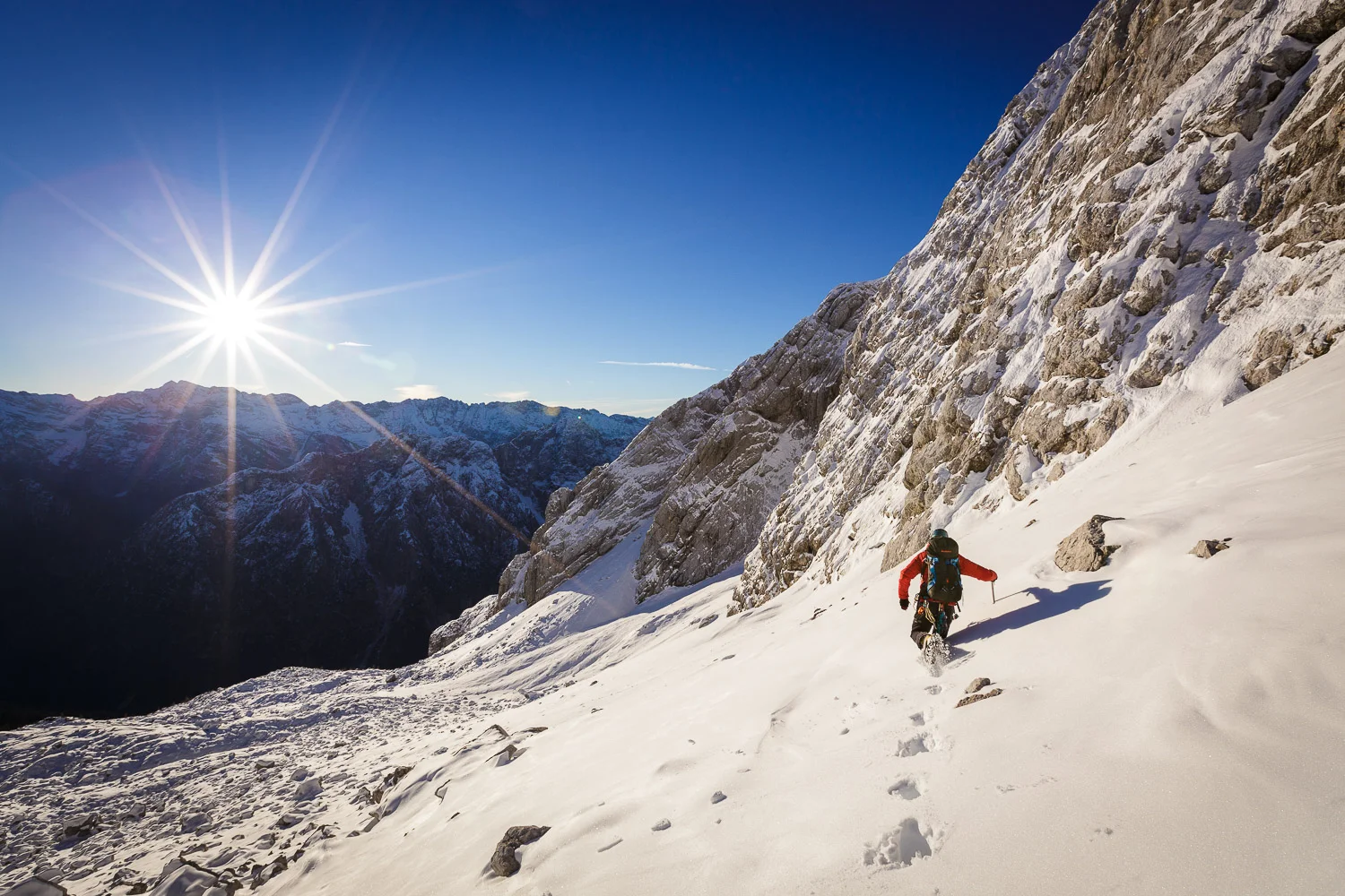 Early start just after sunrise looking for a easy line to our right. Julian Alps, Slovenia.