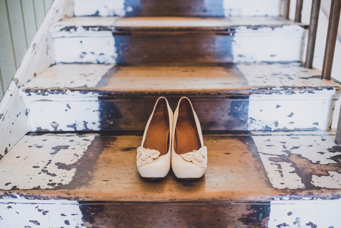 Brides shoes on stairs Fforest wedding