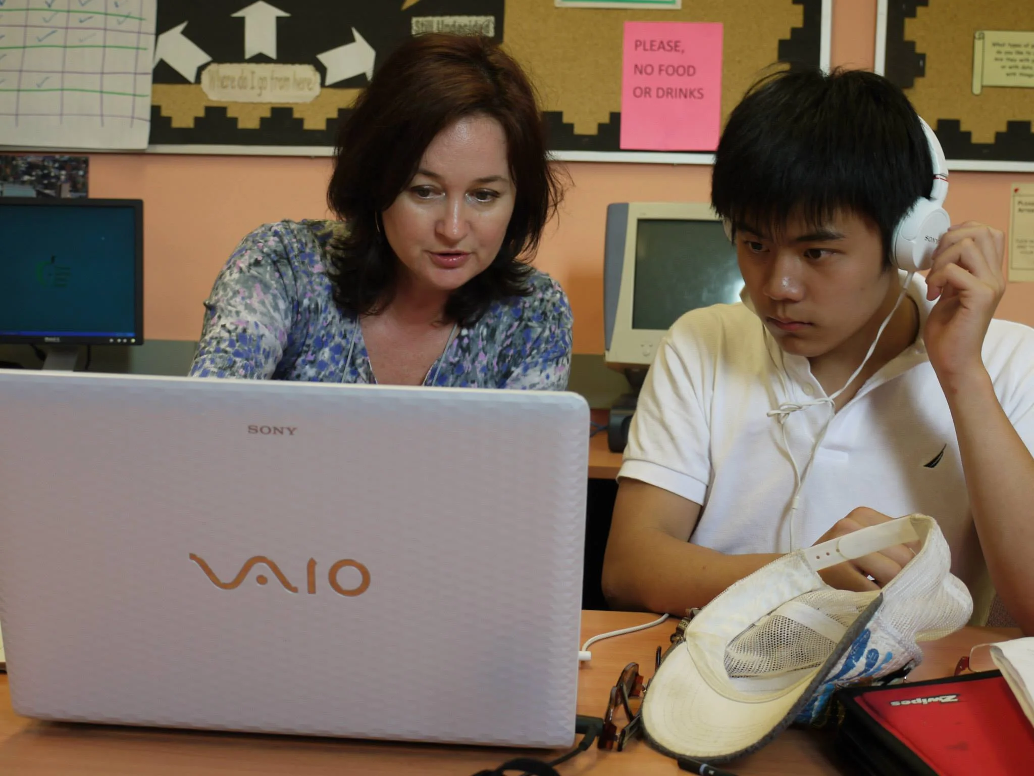 SEPT STAFF WORKING WITH NEWCOMER STUDENTS TO CREATE DIGITAL STORIES
