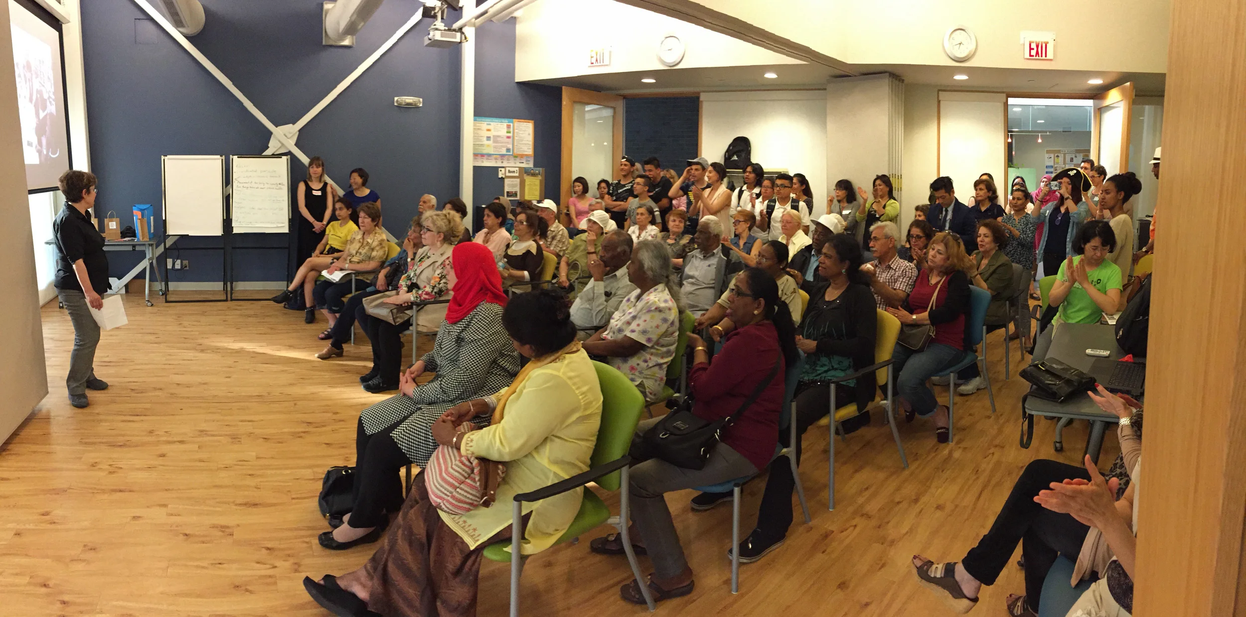 Executive Director Shelley Zuckerman shares some remarks to a full house