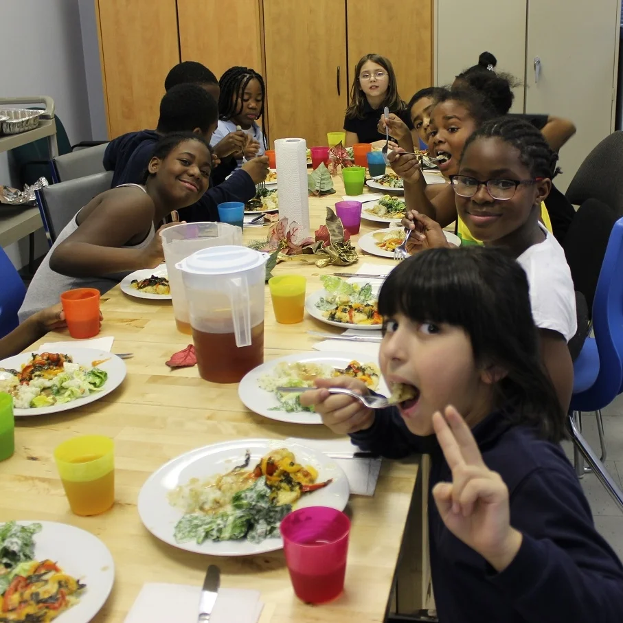After-school program enjoying a healthy meal
