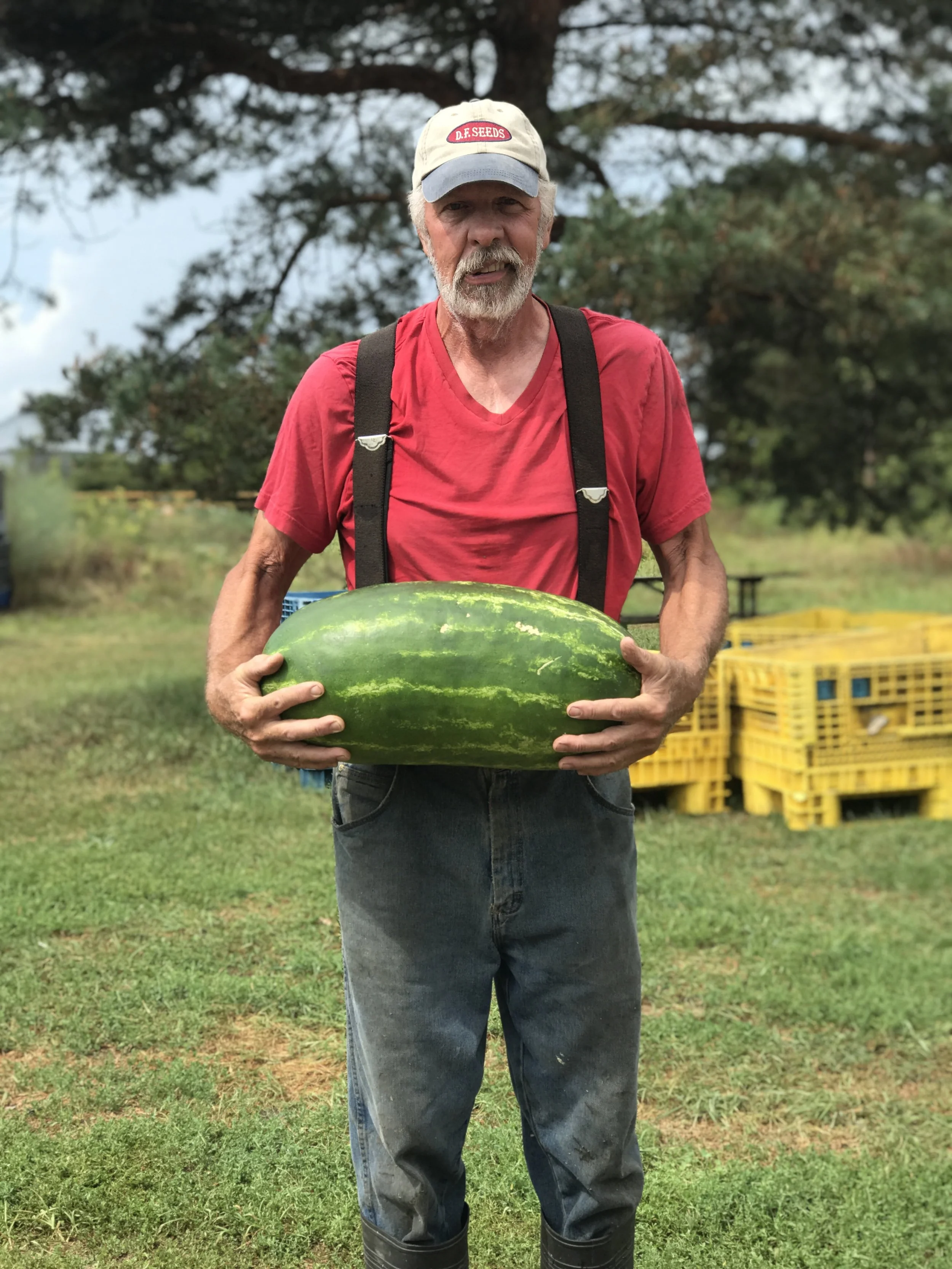 Paul holding a watermelon