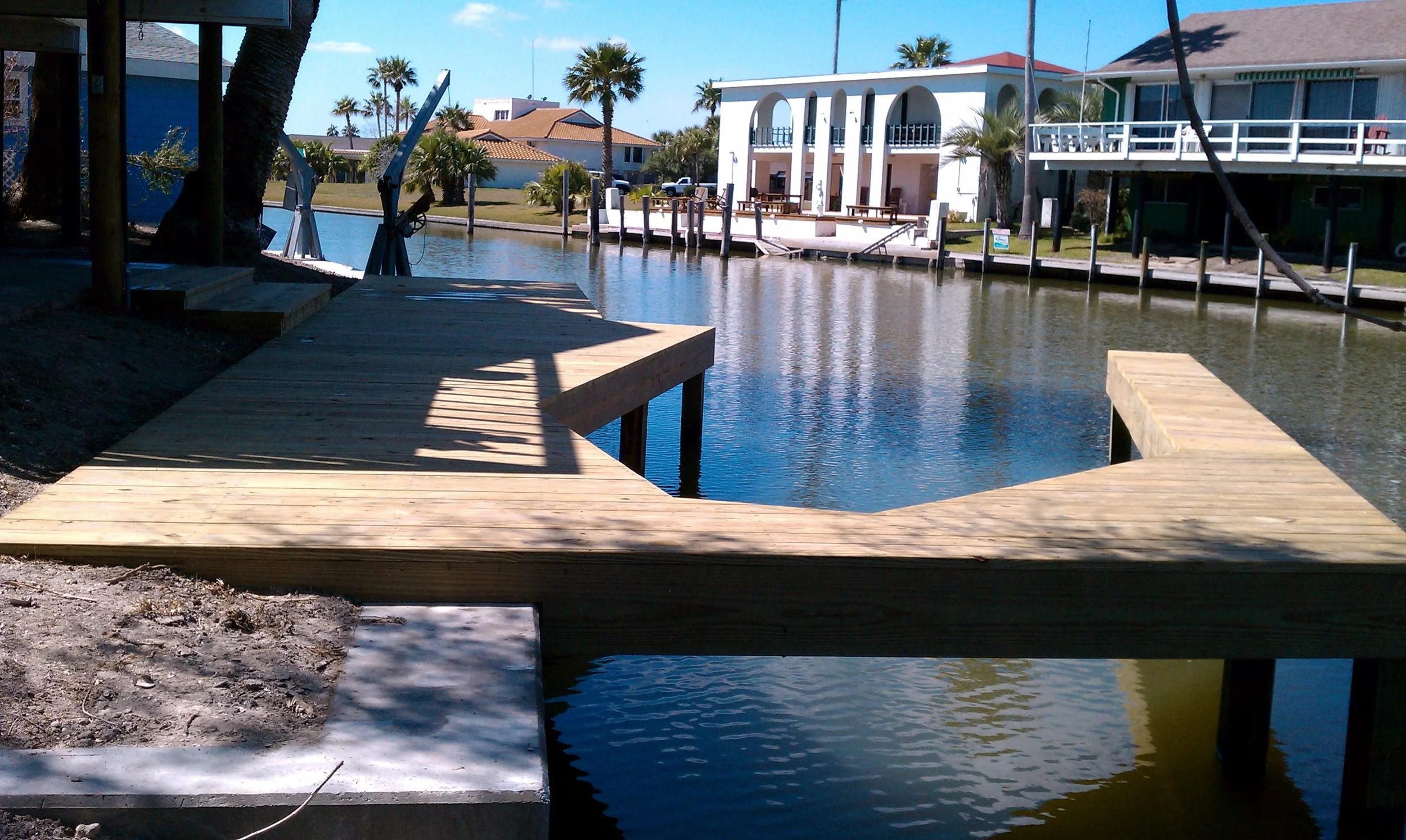 Wrap around dock in Rockport, Texas with finger pier.