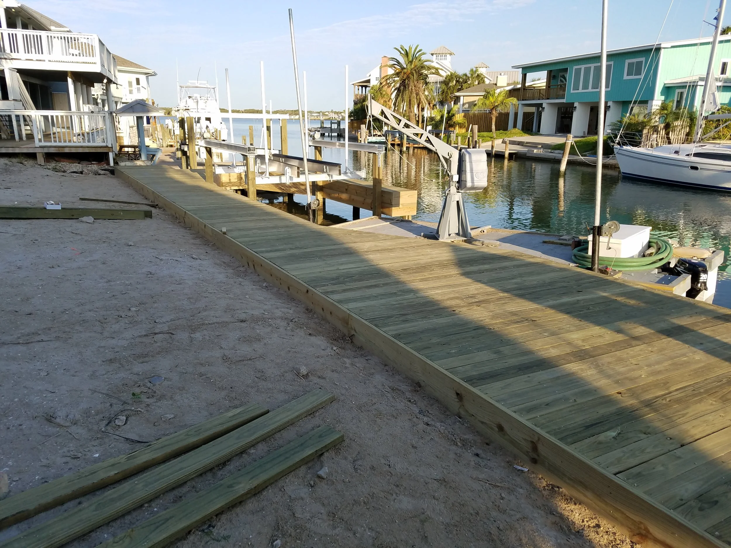 Boatlift, pier and wrap around finger pier.