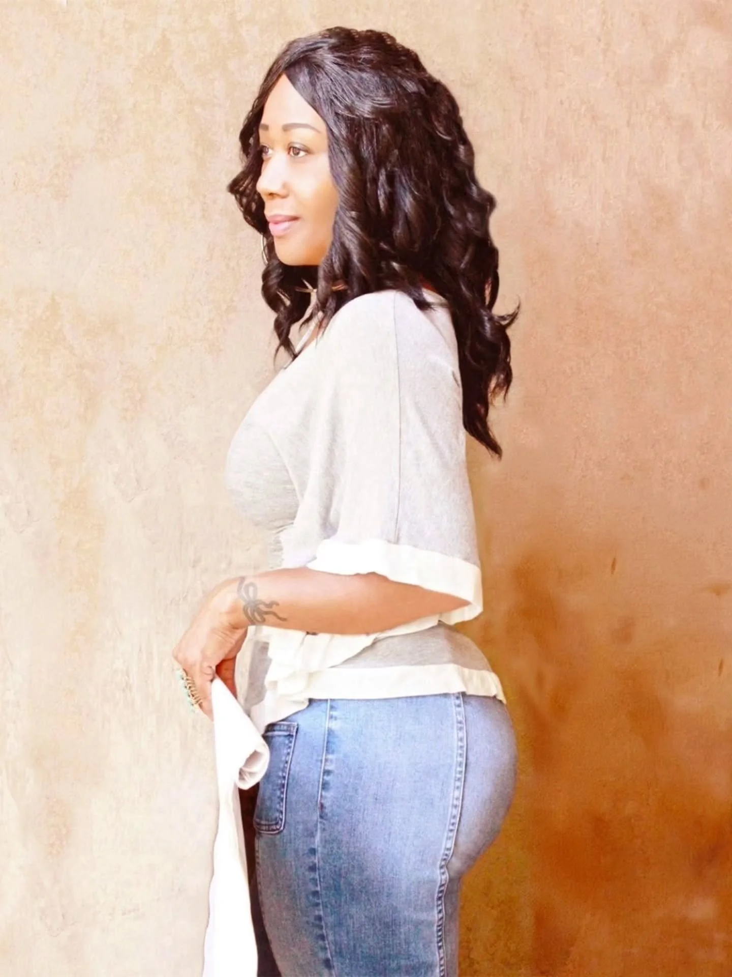 Paint with Purpose: Selecting a Hallway Color for Adjoining Rooms

A hallway like this isn't just a hallway&mdash;it connects to an opposite hallway, a dining room, a living room, a kitchen, a bedroom suite, and a guest bathroom. 

It also complement