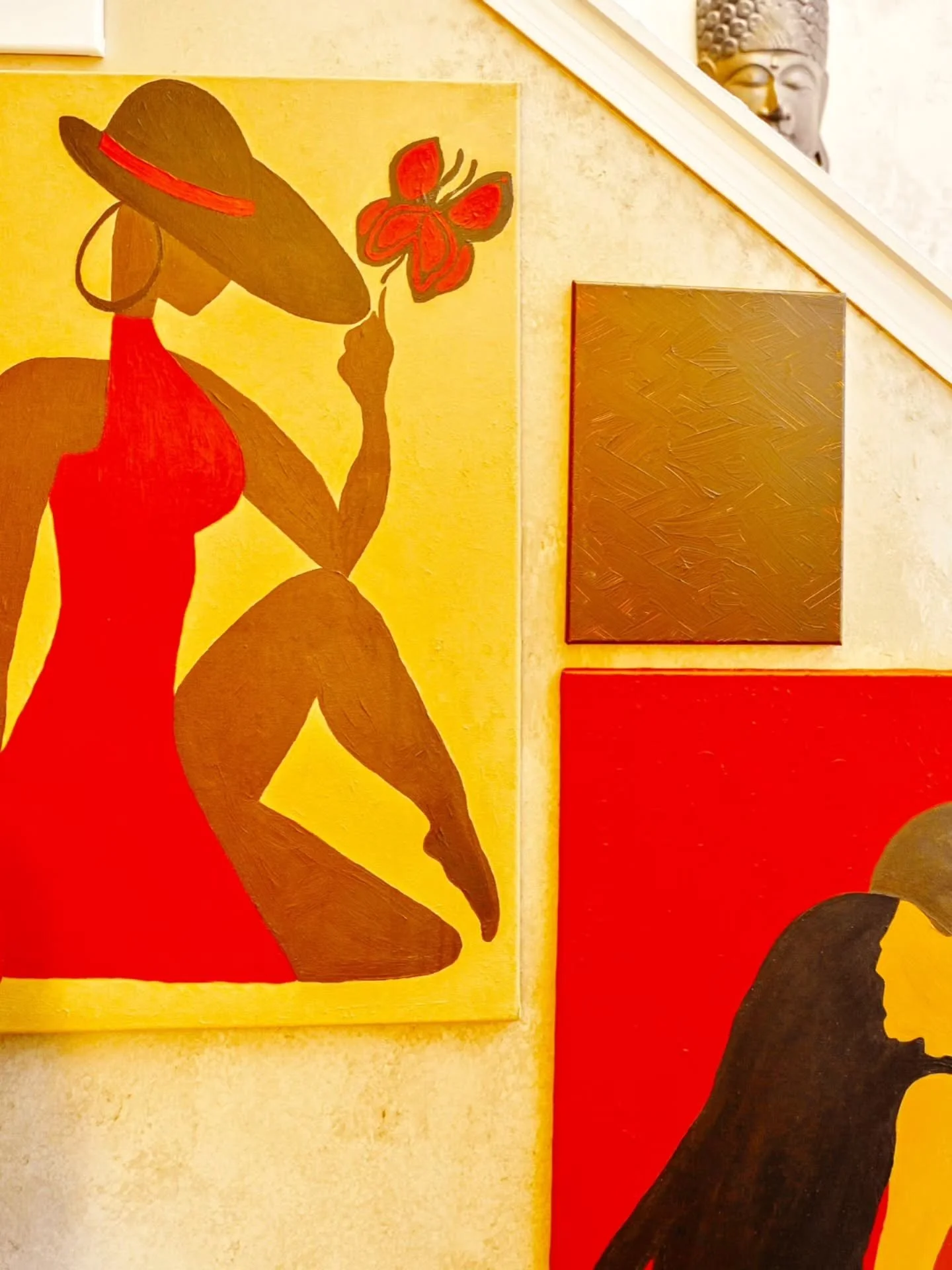 There is nothing like art that demands attention. Look at her stylishly hanging in a hallway full of colorful art&mdash;and still demanding attention.

The bold colors of brown, red, and yellow with raw energy, and zero apologies!

&mdash;XK