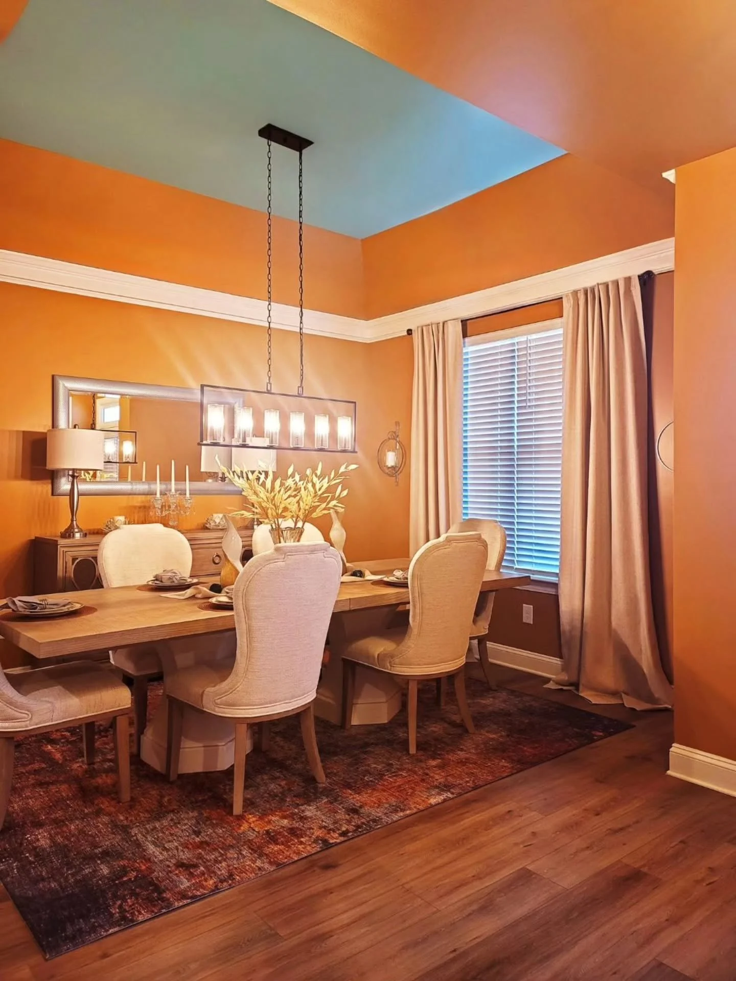 A dining room is more than a space for meals; it's an opportunity to create memorable experiences.

For this project, the goal was to create a space that felt warm, elevated, and memorable from every angle. From the tropical-inspired ceiling treatmen
