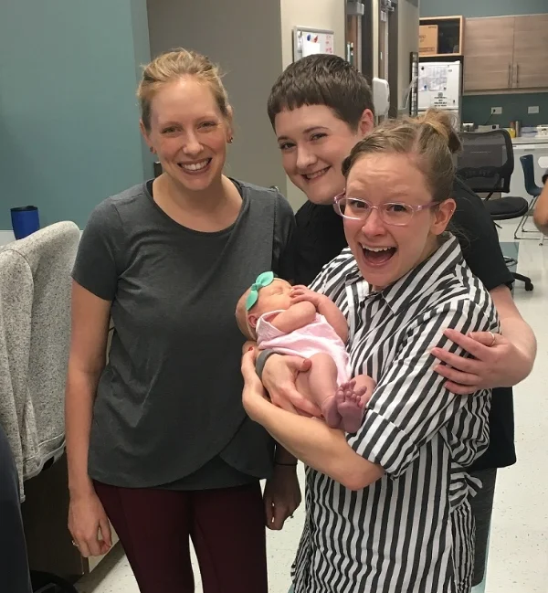 Dr. Geisler, Molly and Anne cooing over baby Charlie Hart!