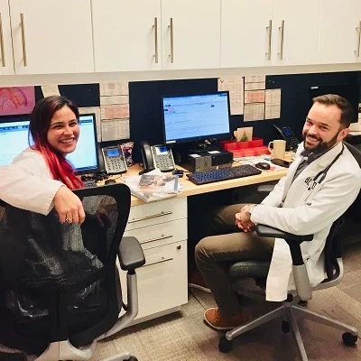 Dr. Cordes and Dr. Dylan in the office.