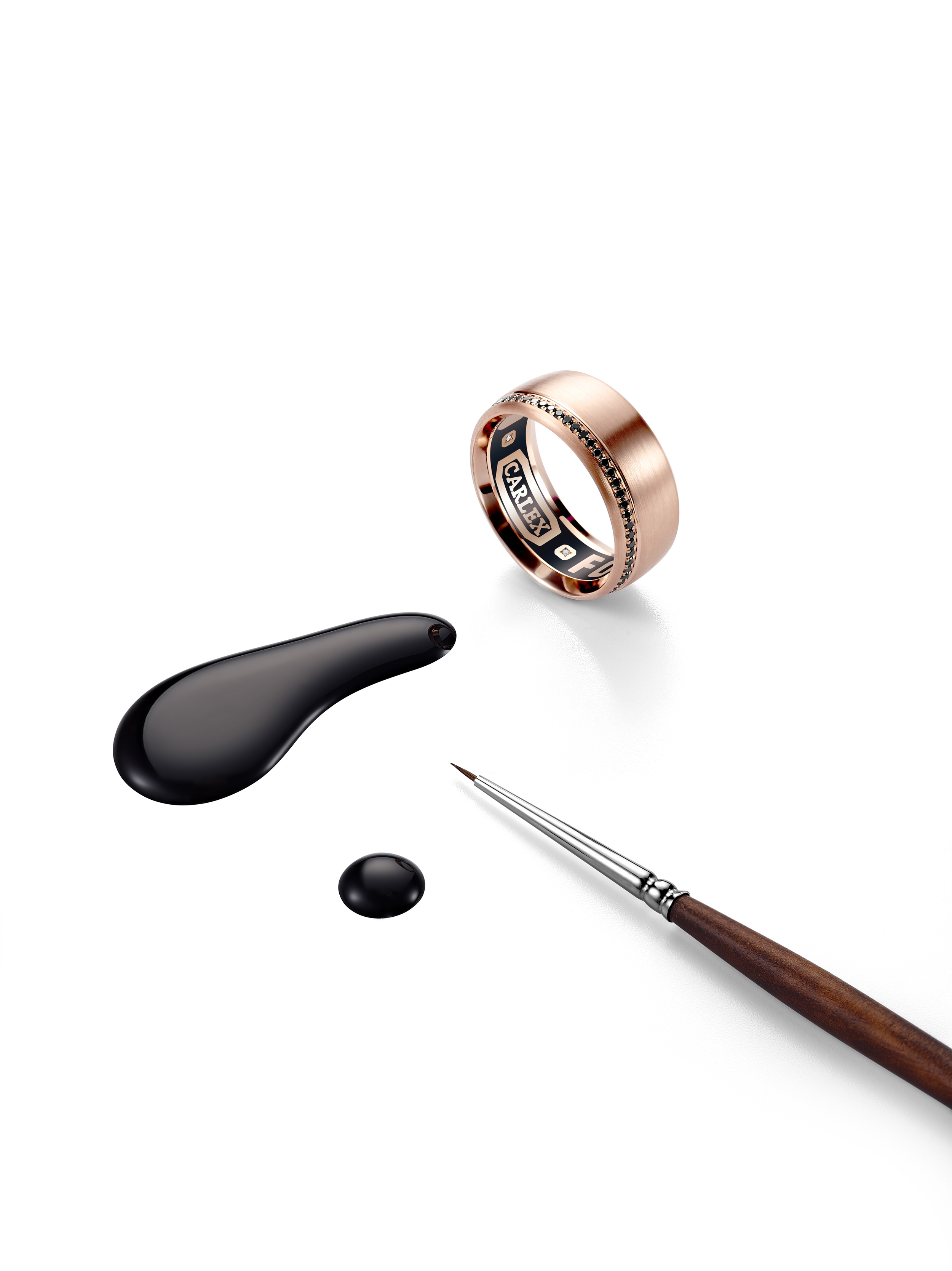 Men's rose gold and black diamond wedding band with enamel puddle