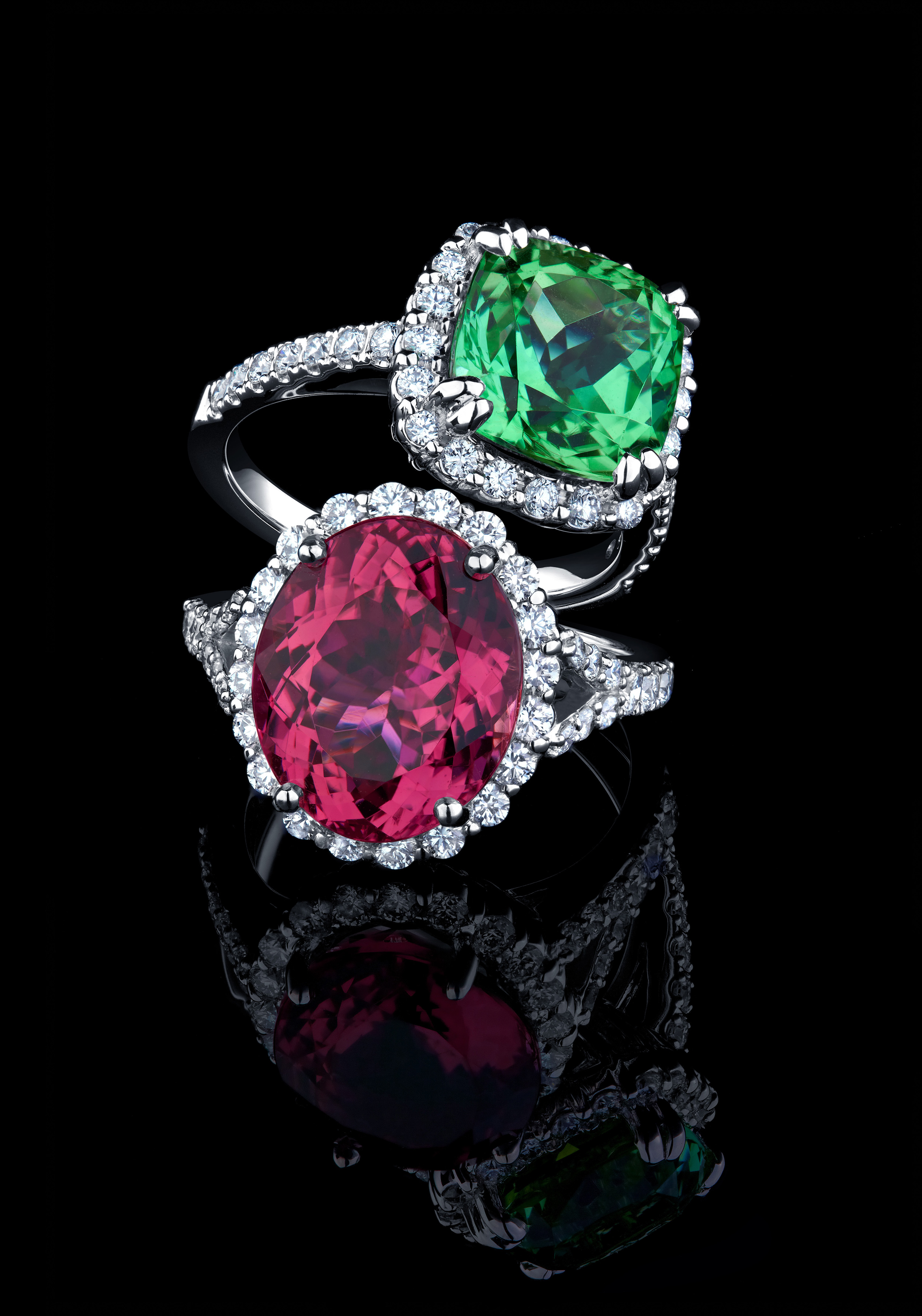 Tourmaline and diamond rings on black