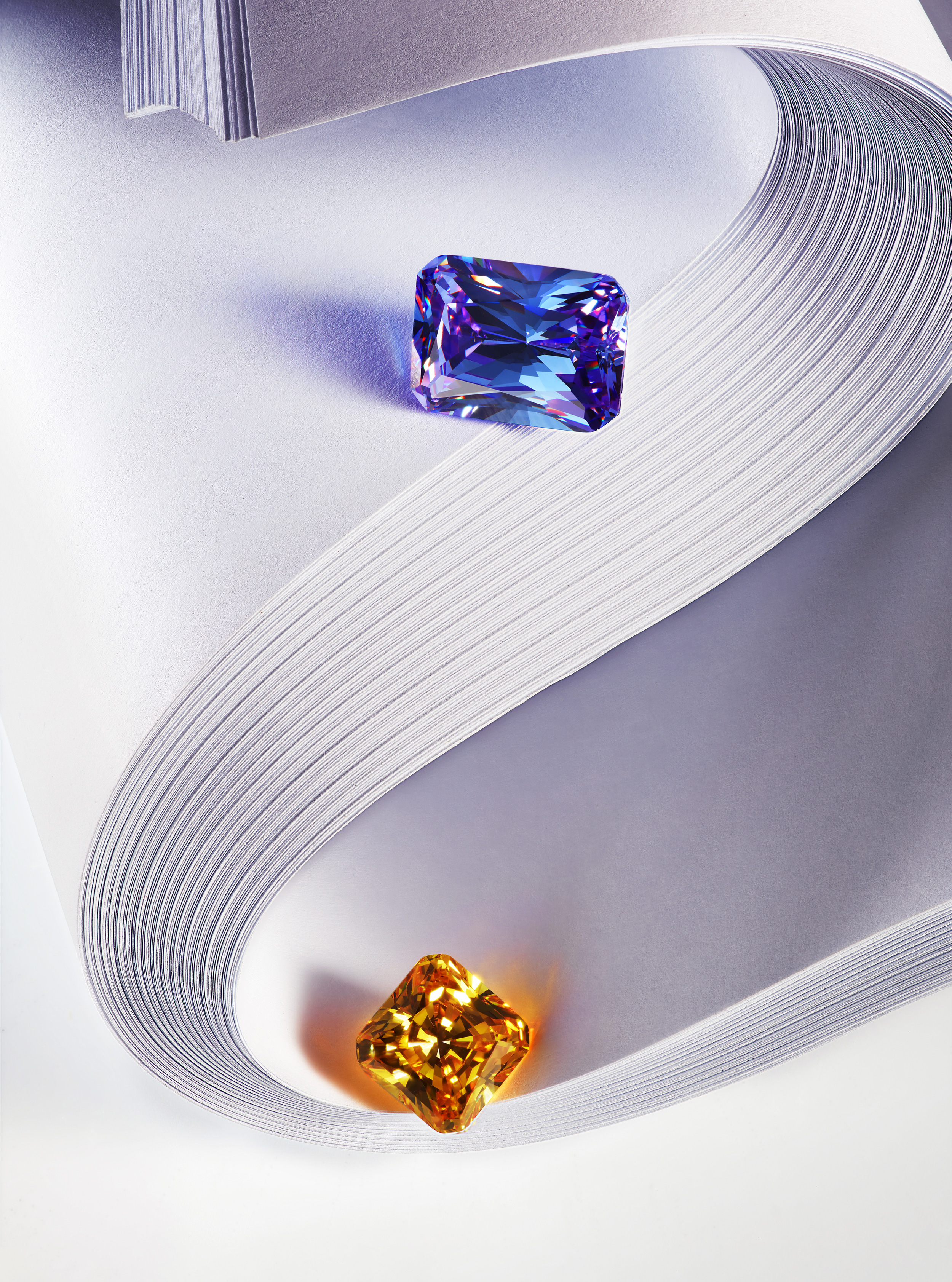 Created gemstones in folded paper curves