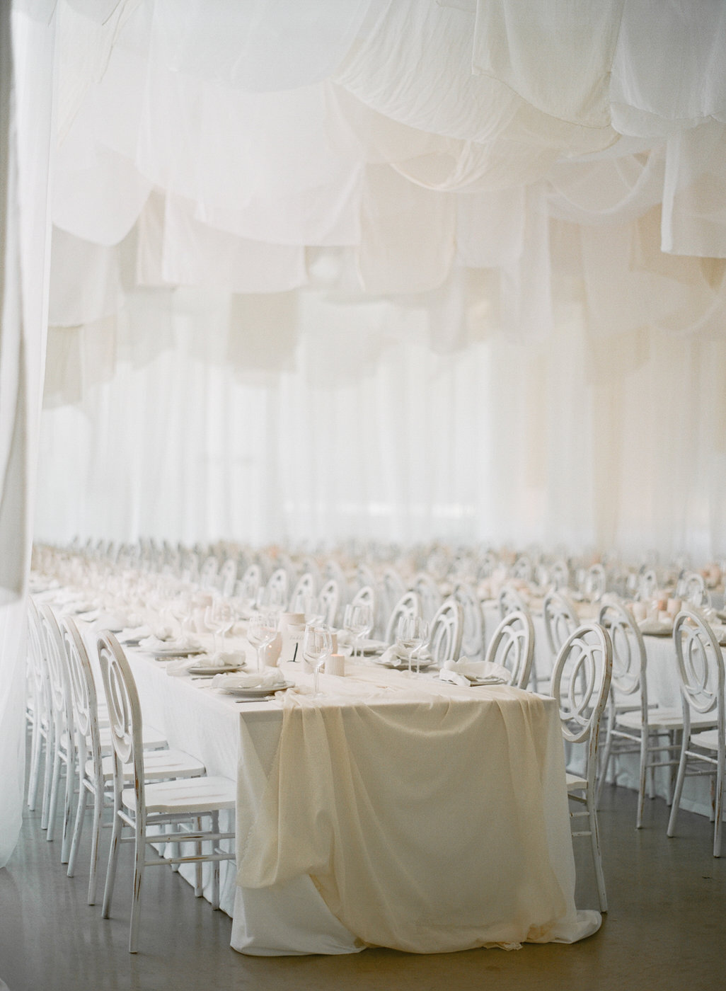 Wedding styling tip: draw the attention upward with drapery