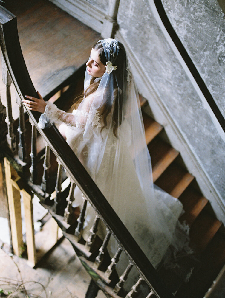 Bride on Staircase with Lace Veil
